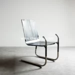 Read more about the article govert flint SPRING chair opens up from two flat  packed sheets of metal