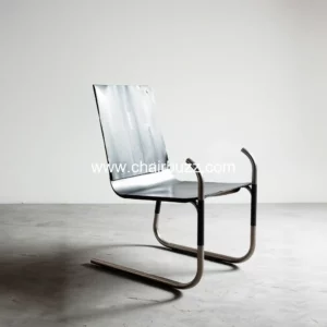 Read more about the article govert flint SPRING chair opens up from two flat  packed sheets of metal